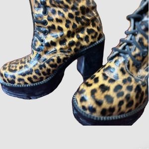 ROC knee-high, cheetah print lease up heels boots